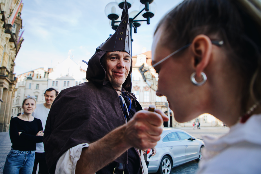 Plague doctor let people to smell the sample of plague cure
